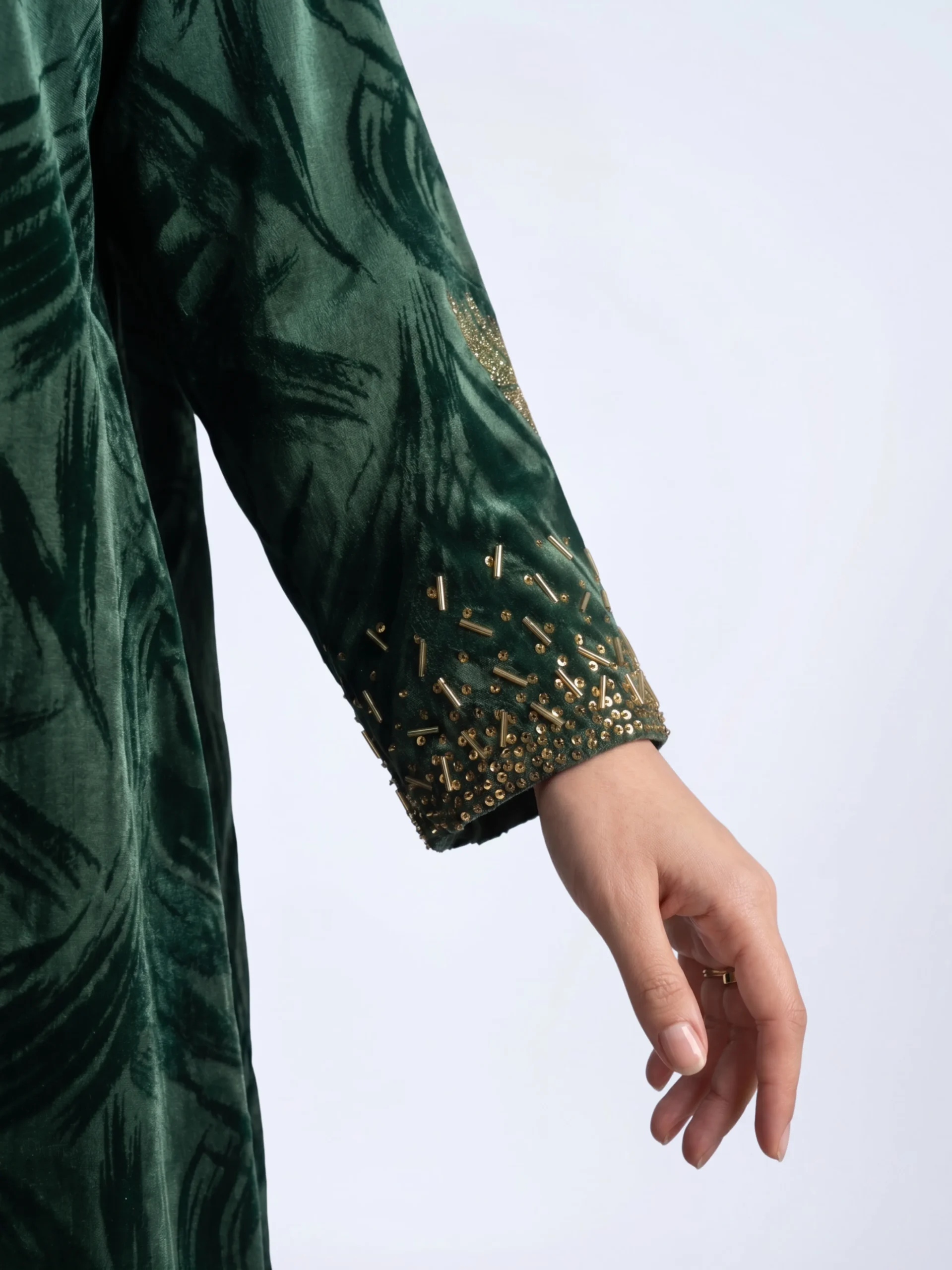 Deep green open abaya with gold embellished abaya detail sleeve